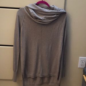 A light cowell neck sweater